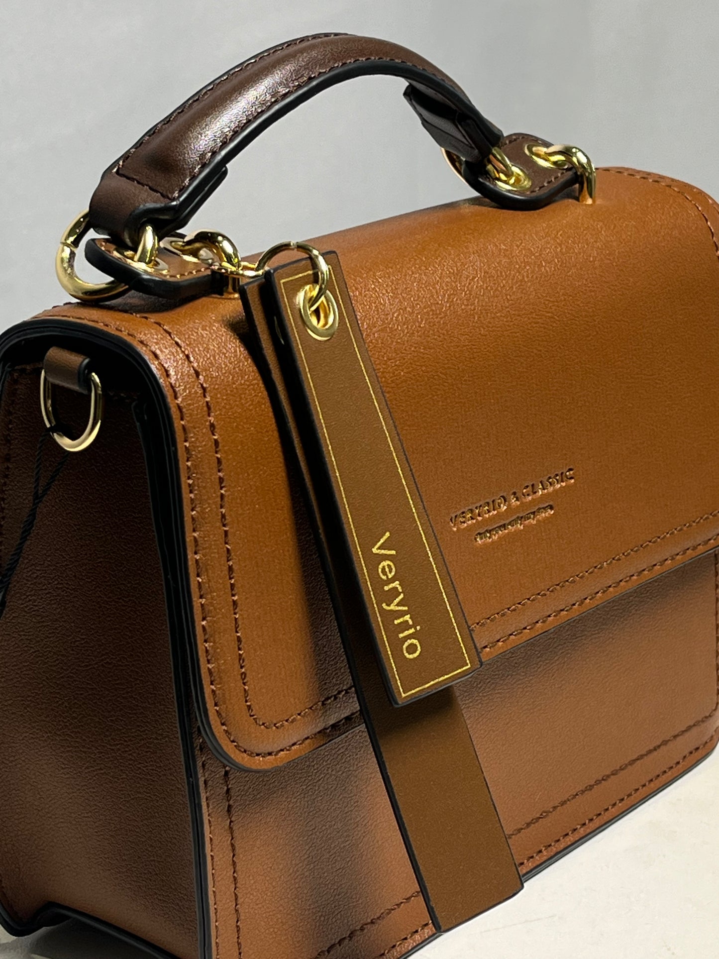 Bolsa duas alças pequena com detalhes dourados