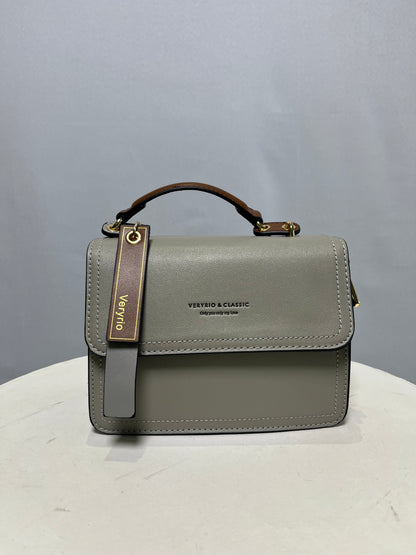 Bolsa duas alças pequena com detalhes dourados