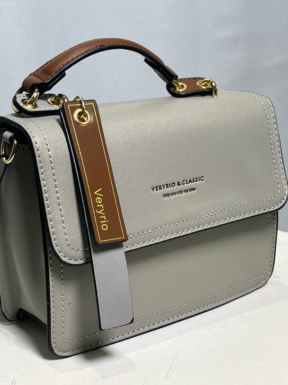 Bolsa duas alças pequena com detalhes dourados